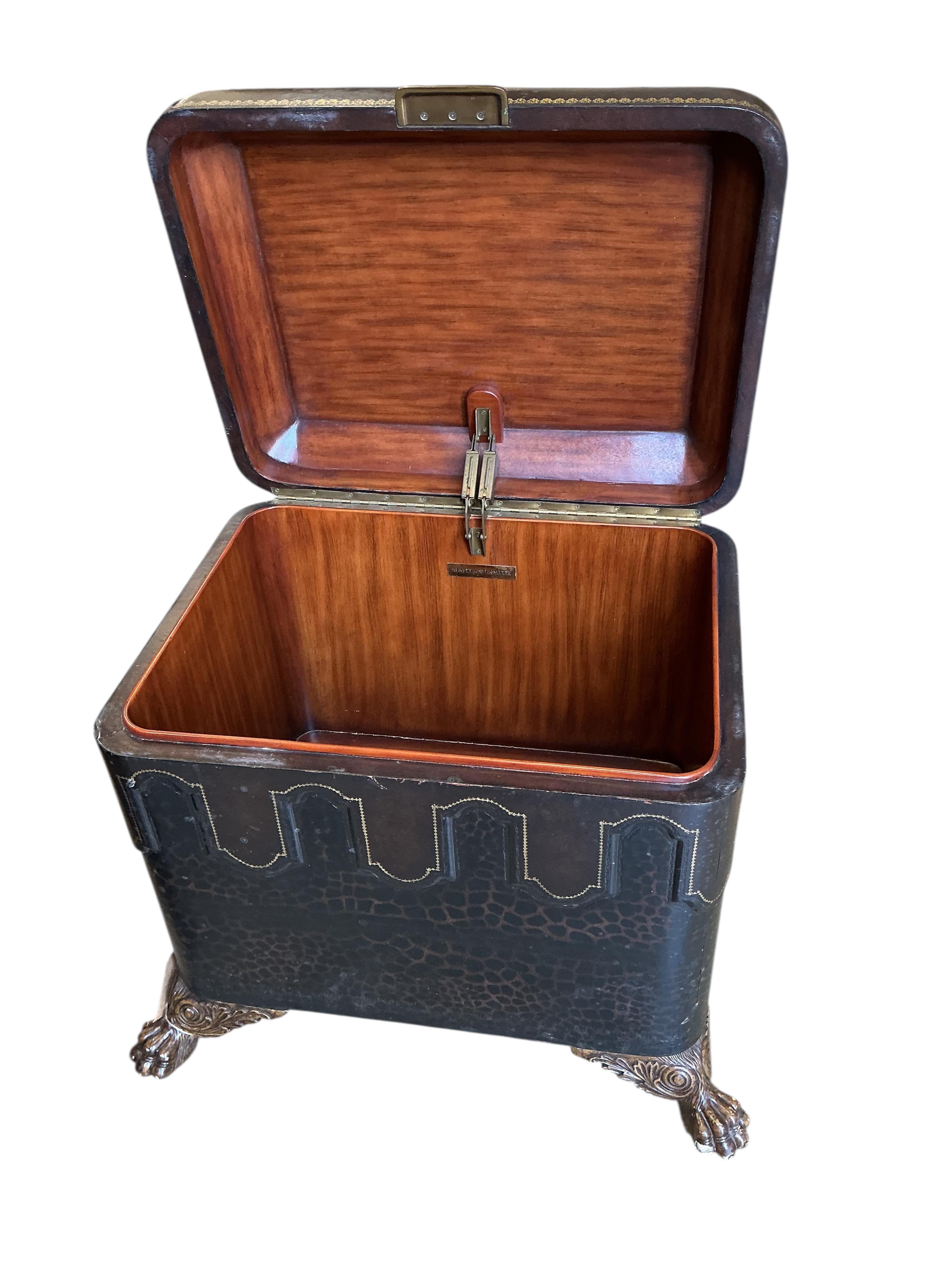 A pair of Contemporary Maitland Smith leather covered, leopard print trunks on lions paw feet, width 74cm, depth 58cm, height 60cm